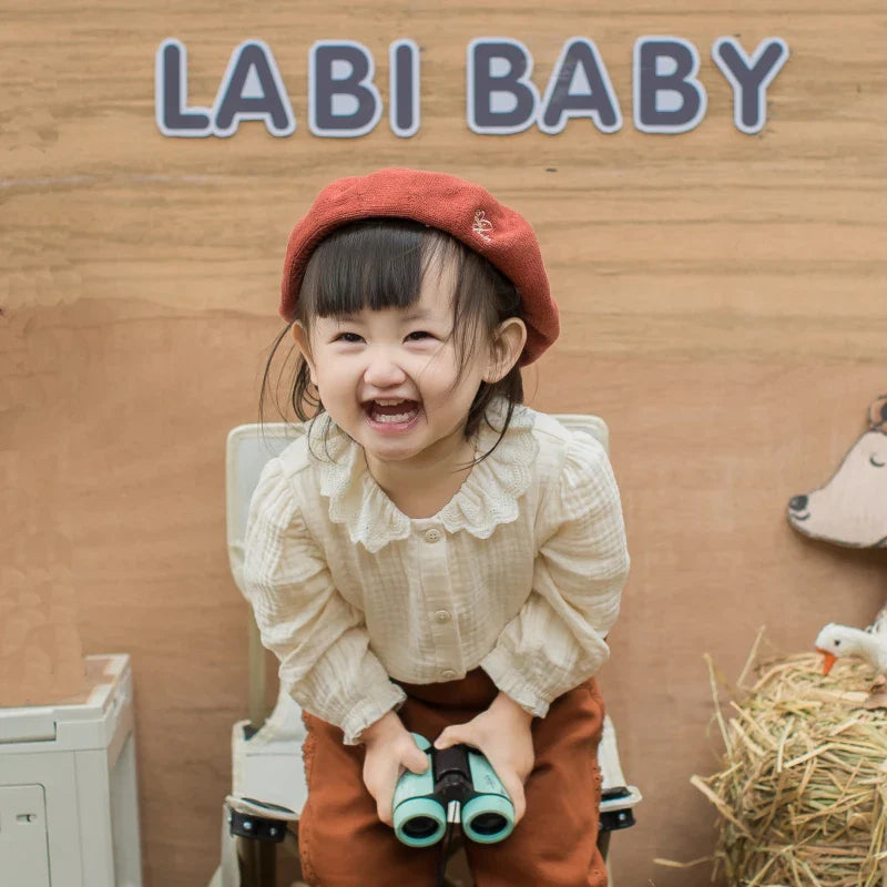 Autumn Elegance: The Perfect Beige Blouse for Your Little One